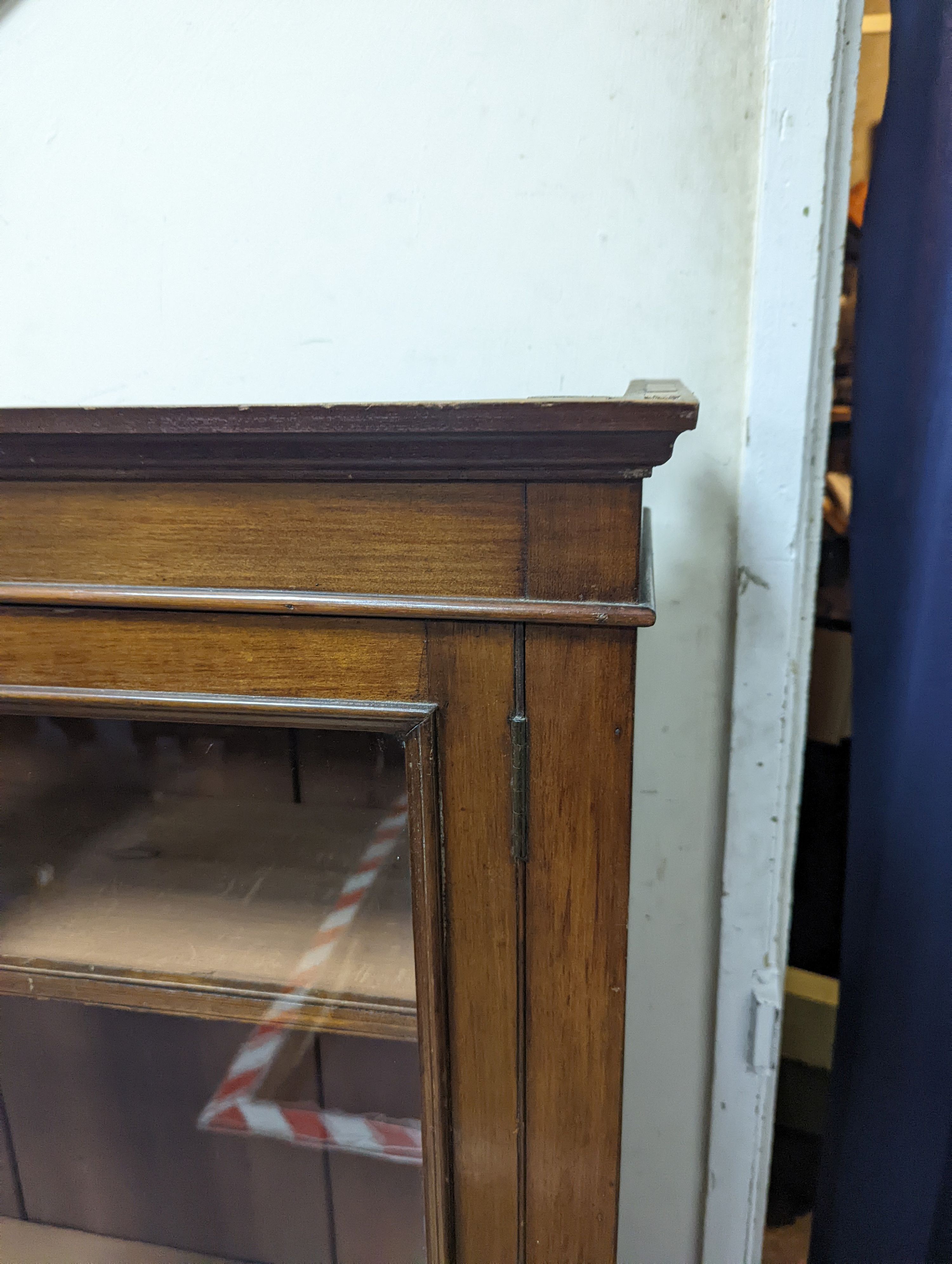 A Victorian style mahogany bookcase top section, width 92cm, depth 28cm, height 118cm